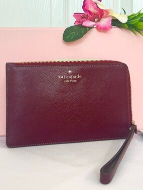 KATE SPADE ~ Rich Burgundy Colored Saffiano Leather Wrap-Around Zip Wristlet